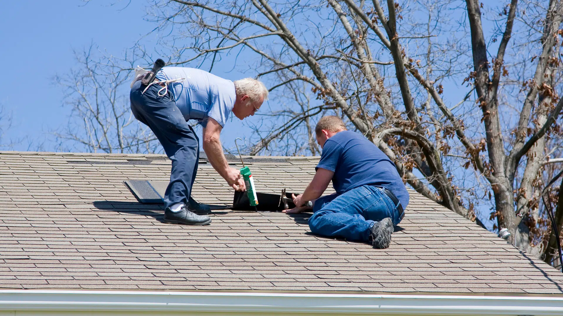 roofer sitting on the roof